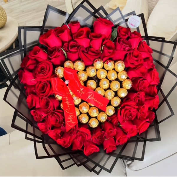 Heart-shaped bouquet of red roses with Ferrero Rocher chocolates