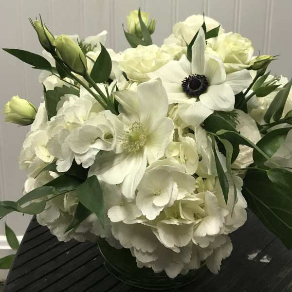 White floral bouquet with anemones and hydrangeas