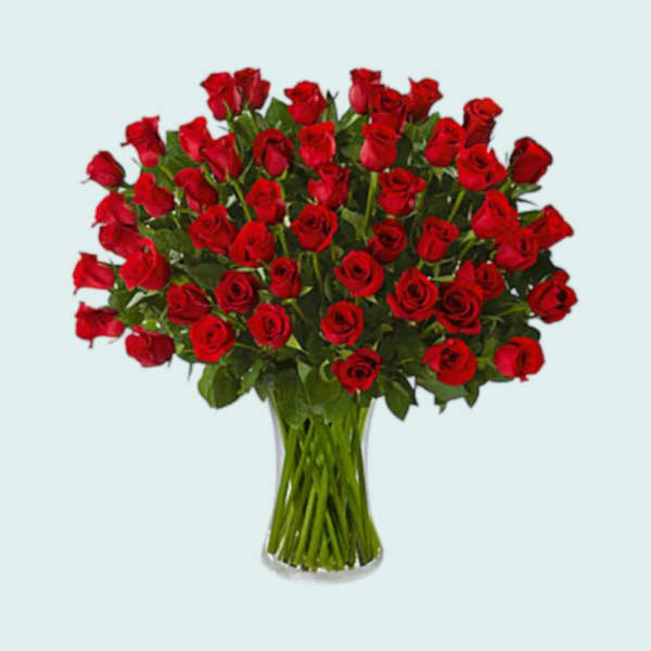 Bouquet of red roses in a clear glass vase