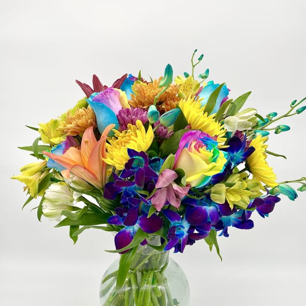 Colorful mixed bouquet in a clear glass vase
