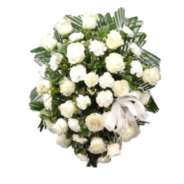 White rose and carnation bouquet with a white ribbon