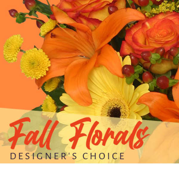 Orange and yellow floral arrangement with roses and lilies