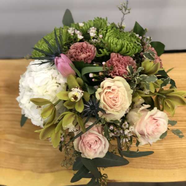 Bouquet of pink roses, white hydrangea, and green chrysanthemums