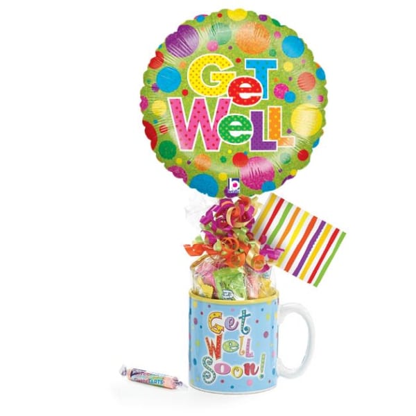 Get Well balloon above a gift mug with candy and ribbon