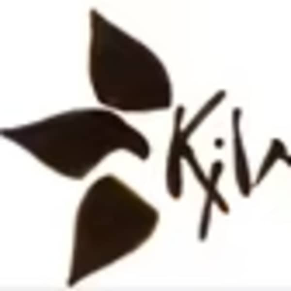KiwiKi logo with three leaf shapes on a white background