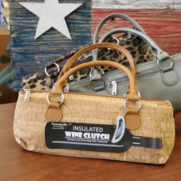 Three insulated wine clutch bags in cork, leopard print, and gray