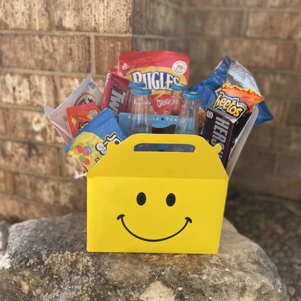 Yellow smiley-face gift box filled with candy and small soda bottles