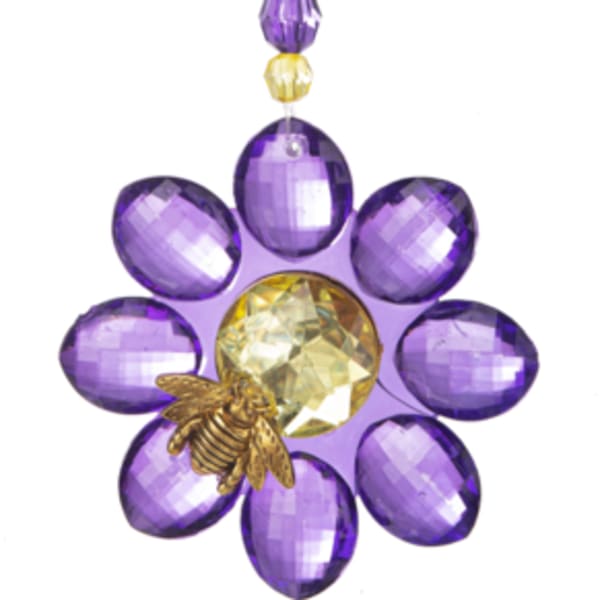 Purple beaded flower ornament with a bee charm on a hanging loop