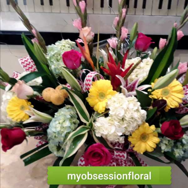 Mixed bouquet with roses, hydrangeas, gerbera daisies, and lilies