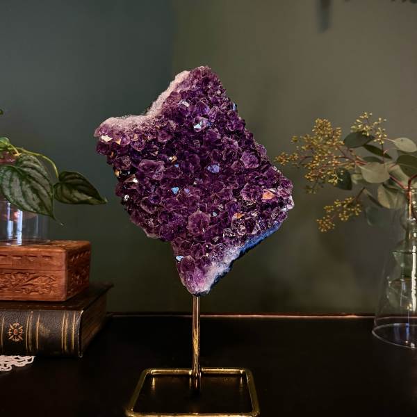 Purple crystal cluster on a gold stand