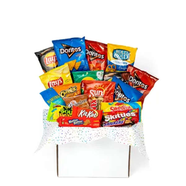 Assorted snack bags arranged in a gift basket with polka-dot wrap