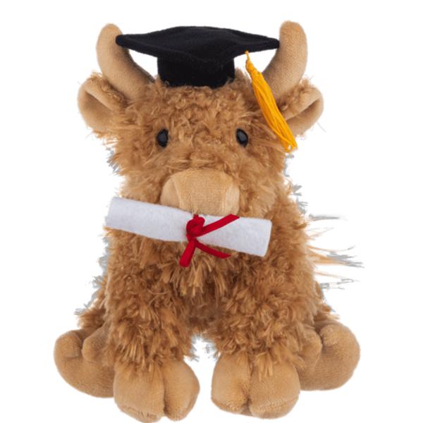 Brown plush cow wearing a graduation cap and holding a rolled diploma with red ribbon