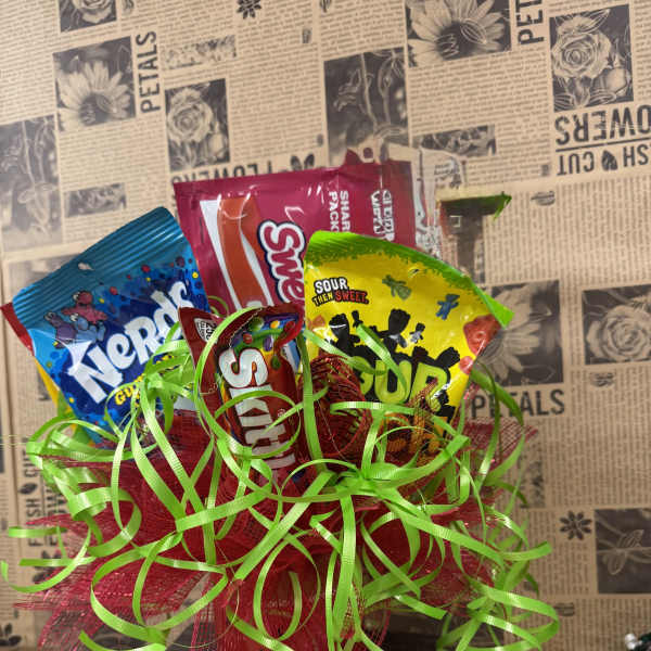 Candy bouquet with assorted snack bags and bright ribbon curls