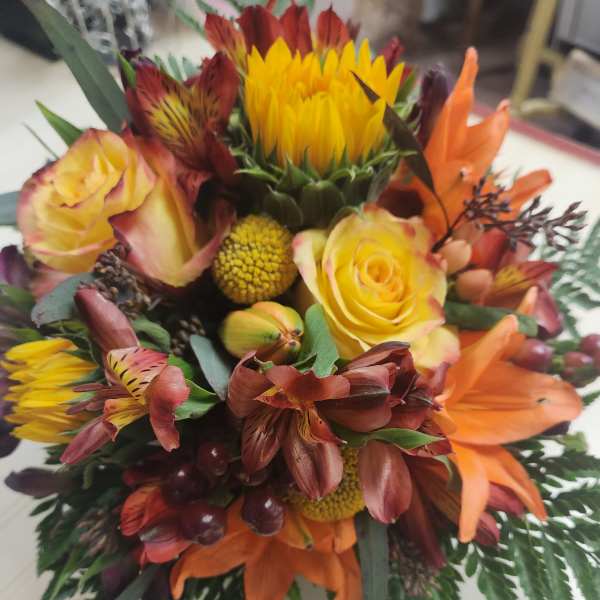 Mixed bouquet with yellow roses and orange lilies