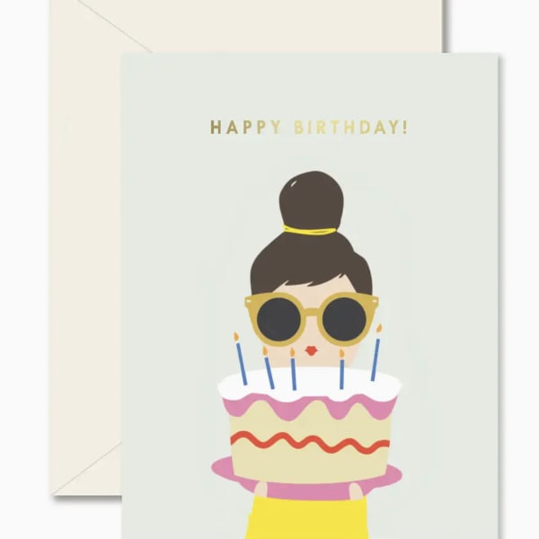 Birthday card with a cartoon woman holding a cake