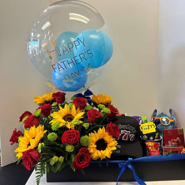 Gift box with red roses, sunflowers, balloons, and Father's Day items