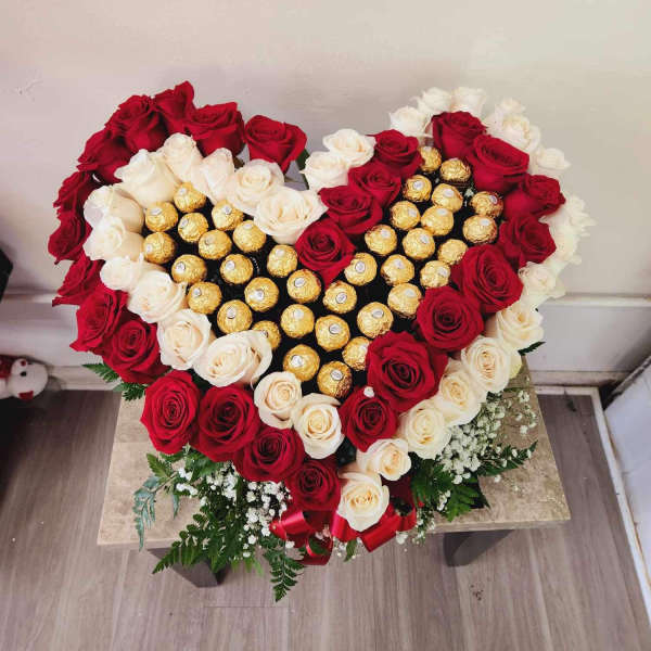 Heart-shaped rose arrangement with Ferrero Rocher chocolates