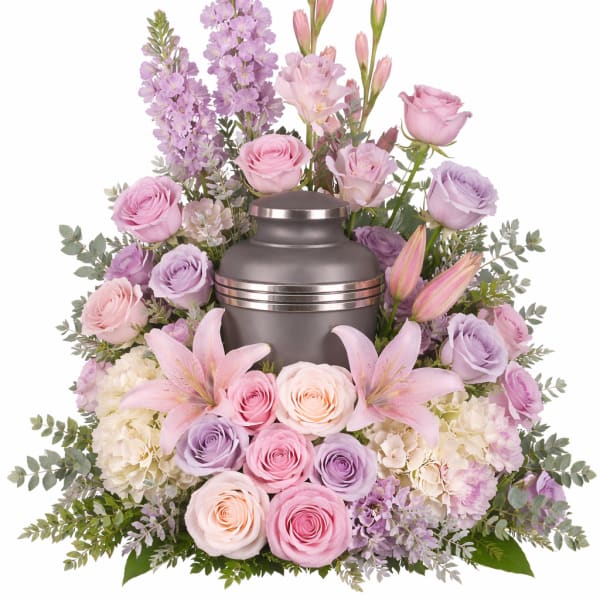 Pastel pink and lavender floral urn arrangement with a metal urn