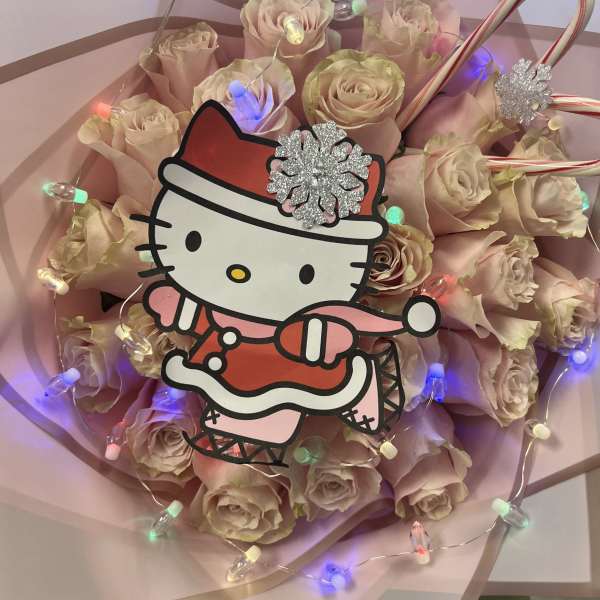 Pink rose bouquet with Hello Kitty decoration and string lights