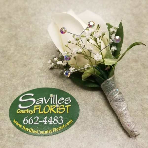 White calla lily boutonniere with baby's breath and jeweled wire accents