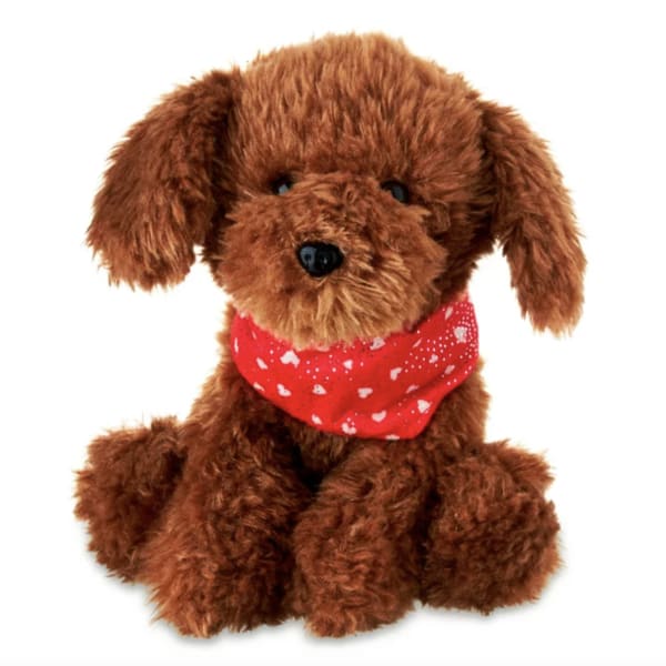 Brown plush dog with a red heart-pattern bandana