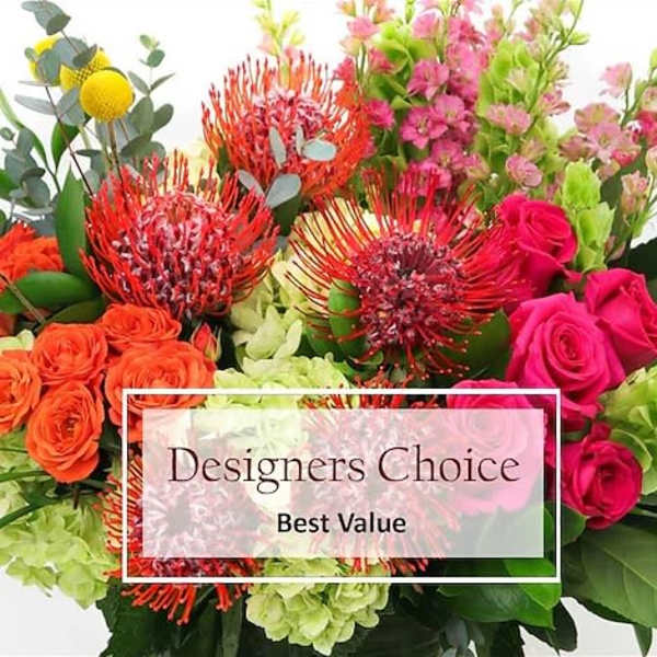 Mixed bouquet with orange and pink roses, red pincushion protea, and pink blooms