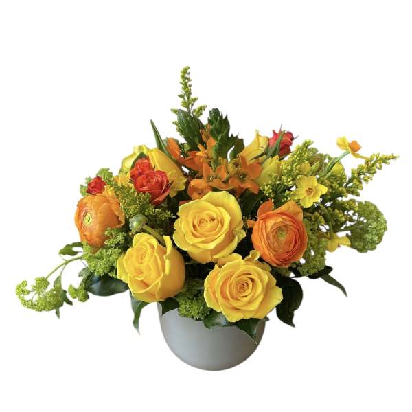 Yellow and orange rose arrangement in a gray vase