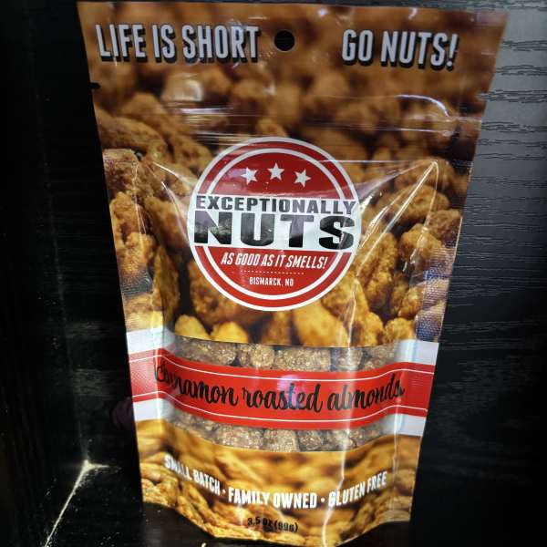 Bag of cinnamon roasted almonds with bold printed label