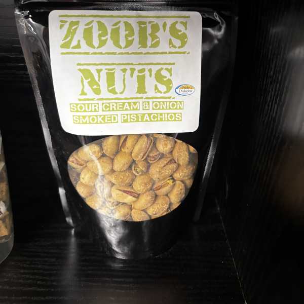 Black bag of sour cream and onion smoked pistachios