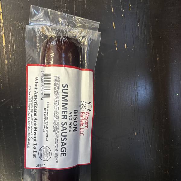 Packaged bison and pork summer sausage in clear plastic wrap