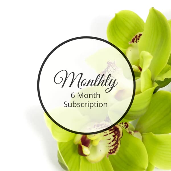 Green orchid blooms with a circular "Monthly 6 Month Subscription" label