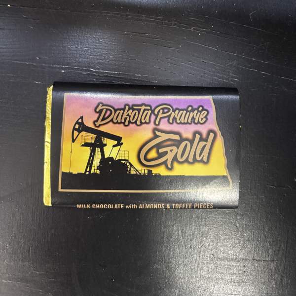 Chocolate bar wrapper labeled Dakota Prairie Gold
