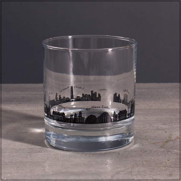 Clear glass tumbler with a black city skyline design