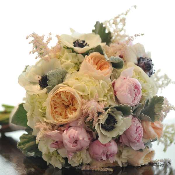 Pastel bouquet with cream, pink, and peach flowers