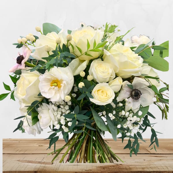 White floral bouquet with roses and anemones