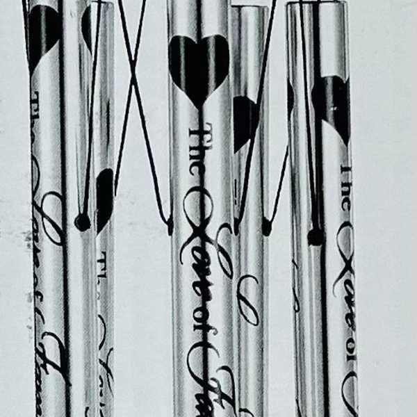 Black metal wind chime with engraved tubes and a LOVE pendant