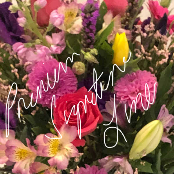 Mixed bouquet with pink, purple, and yellow flowers