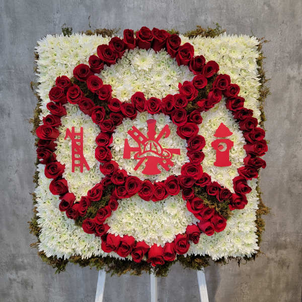 Square floral standing spray with red roses and white chrysanthemums
