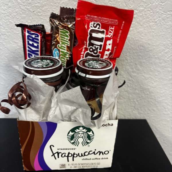 Gift basket with Starbucks Frappuccino bottles and candy bars
