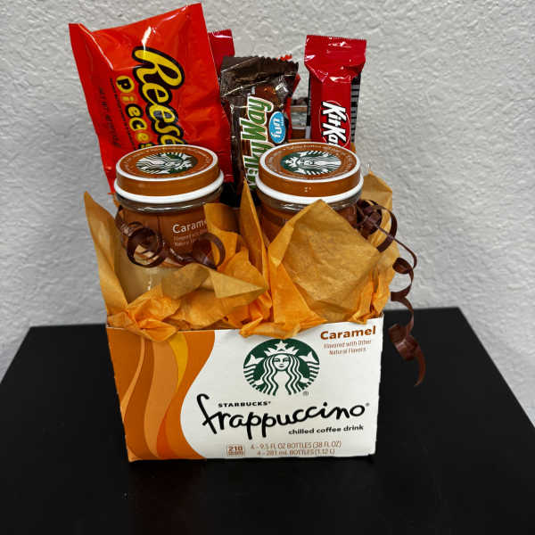 Gift basket with Starbucks Frappuccino bottles and candy bars