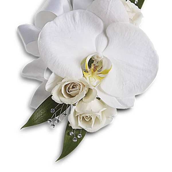 White orchid and rose corsage with ribbon and bead accents