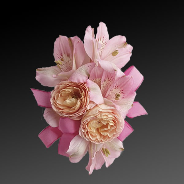 Pink alstroemeria and peach roses with a pink ribbon