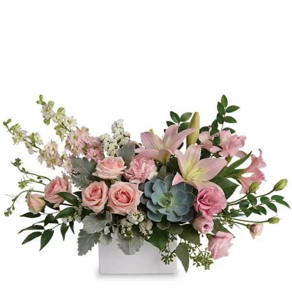 Pink lilies and roses in a white rectangular vase