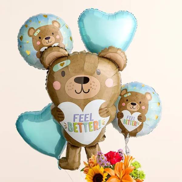 Bear-shaped balloons with a small mixed flower bouquet