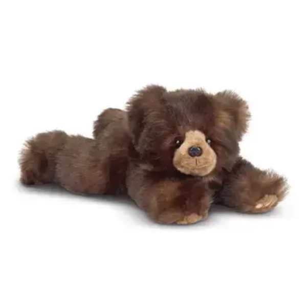 Brown plush teddy bear lying down on a white background
