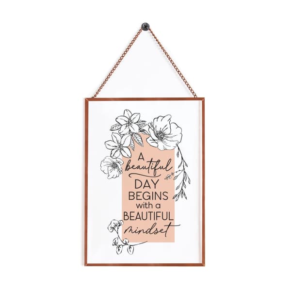 Framed floral quote print hanging by a chain