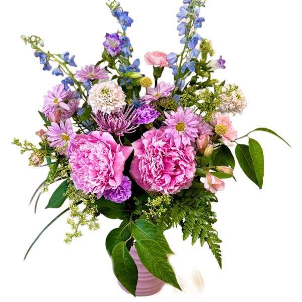 Pink and purple mixed bouquet in a pink vase