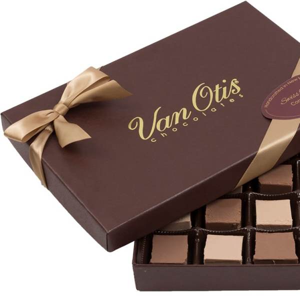 Box of assorted chocolates with a ribbon bow