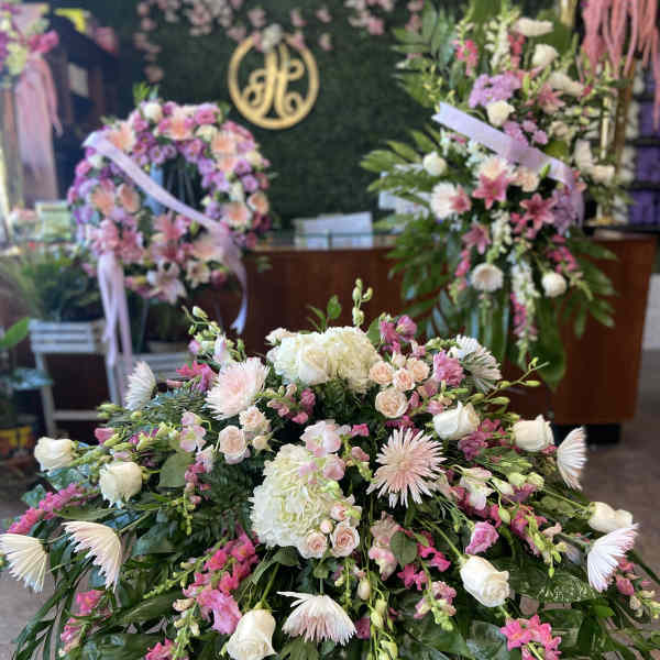 Large pink and white floral spray with roses and hydrangeas