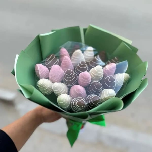 Bouquet of pastel cone-shaped treats wrapped in green paper